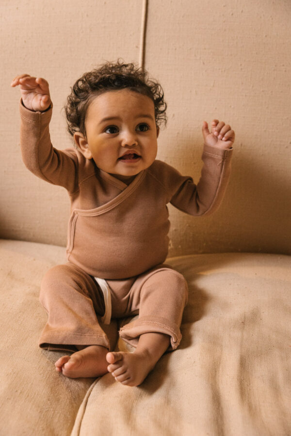 Baby wearing onesie and jogger in pima cotton - biscotti - Puno Collection | UAUA Collections