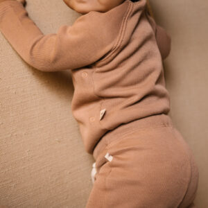 Baby wearing onesie and jogger in pima cotton - biscotti - Puno Collection | UAUA Collections