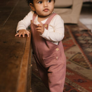 Toddler wearing overall in pima cotton - hibisco- Puno Collection | UAUA Collections